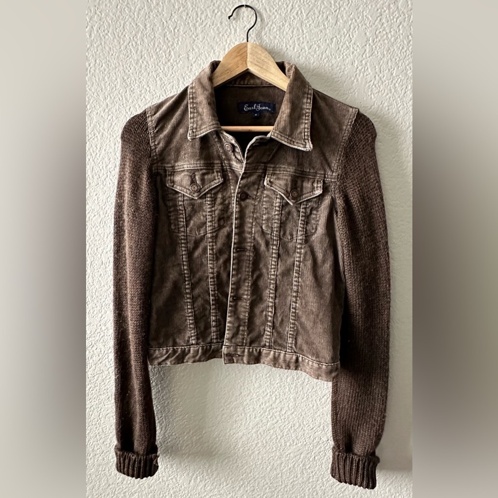 Warm brown corduroy jacket with knit sleeves.